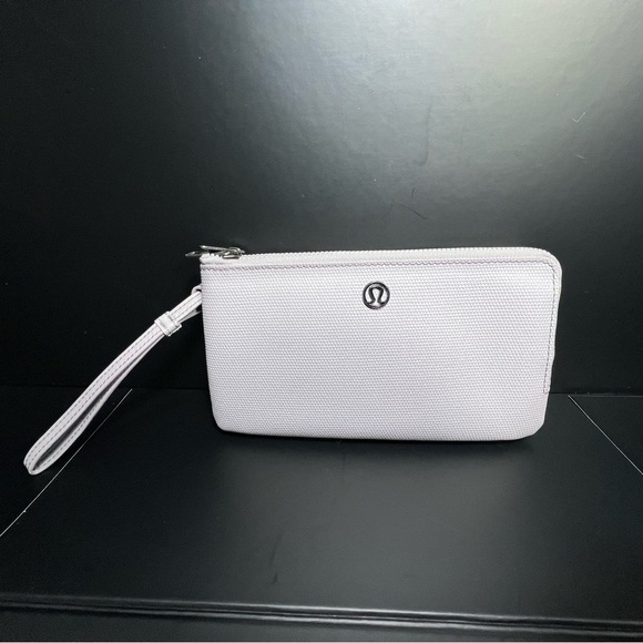 lululemon athletica Handbags - Lululemon Double Up Pouch/Wallet-Levander w/ metal logo medallion